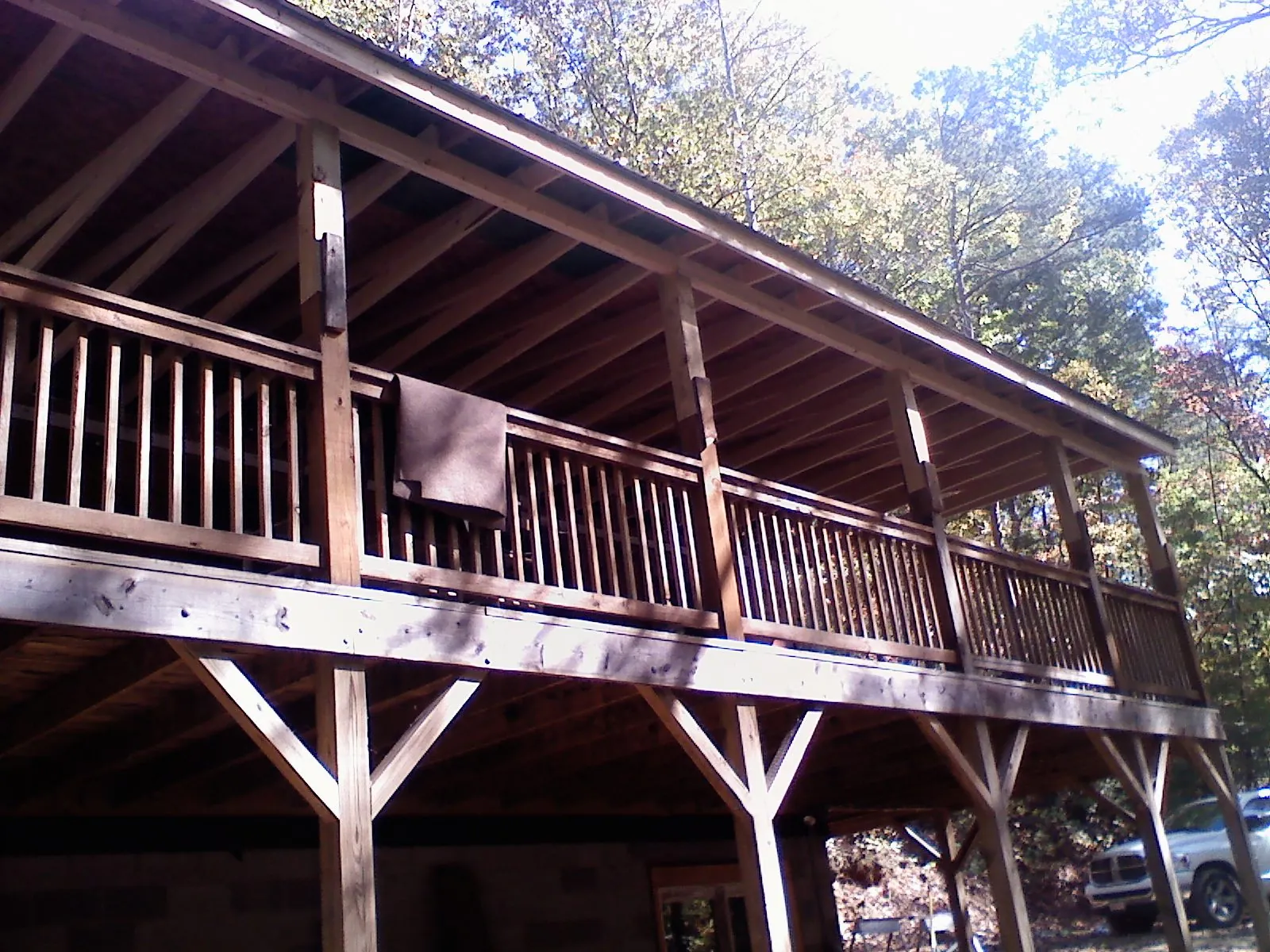 Timber framing under a new elevated porch and deck — Roof Leak Repair in Basile by Roofing Brothers